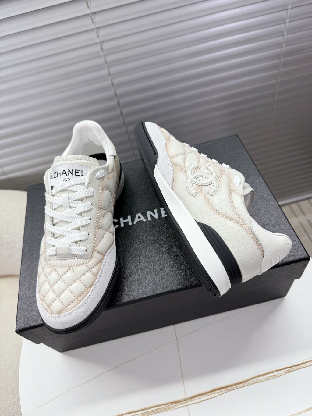 CHANEL 25S TRAINERS WHITE AND LIGHT CORAL IN CALFSKIN